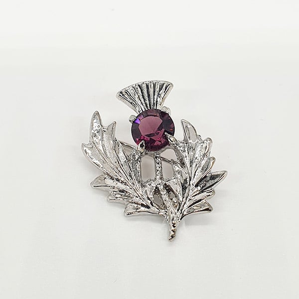 Brosche schottische Distel mit lila Stein